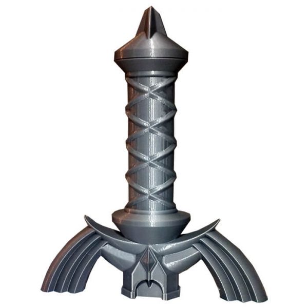 Primer plano de la base decorativa 3D con diseño de la Trifuerza, pintada a mano en gris.